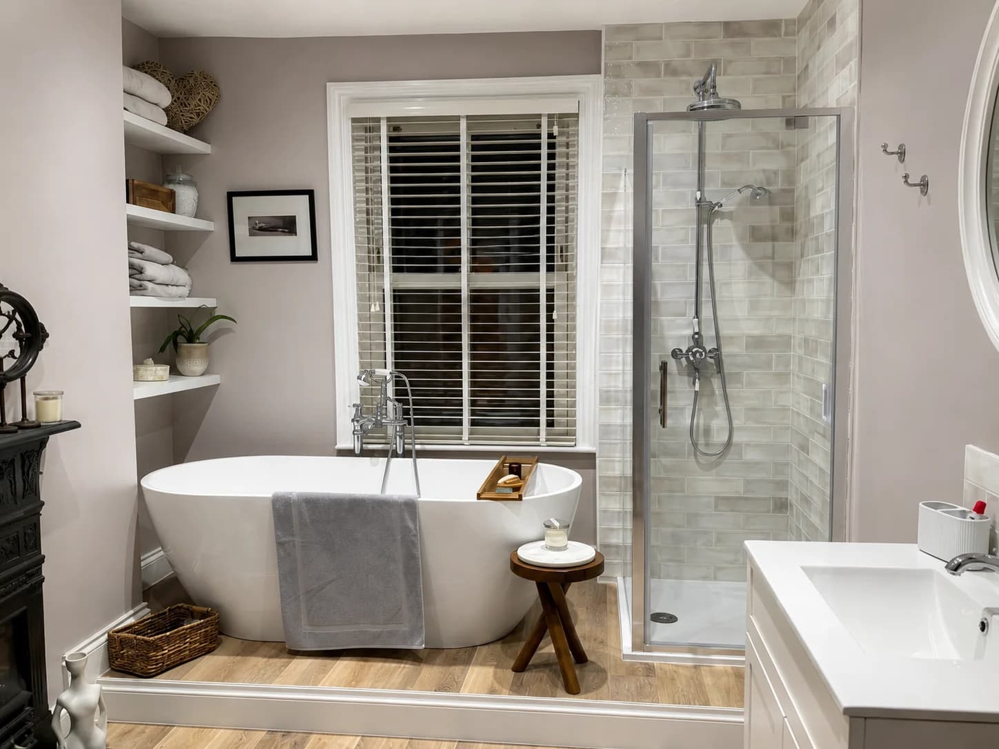 Renovated bathroom with freestanding bath, walk-in shower and oak-effect flooring